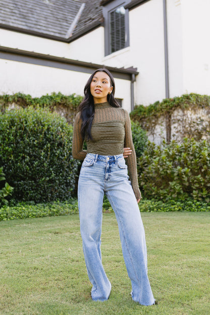 Body con scritta sul muro