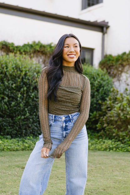 Body con scritta sul muro