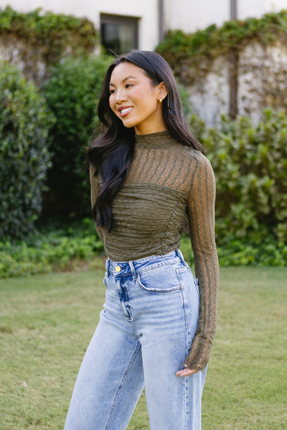 Body con scritta sul muro