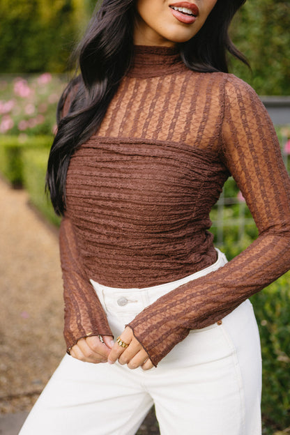 Body con scritta sul muro