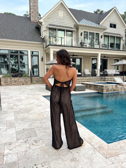 Guardala indossare la tuta