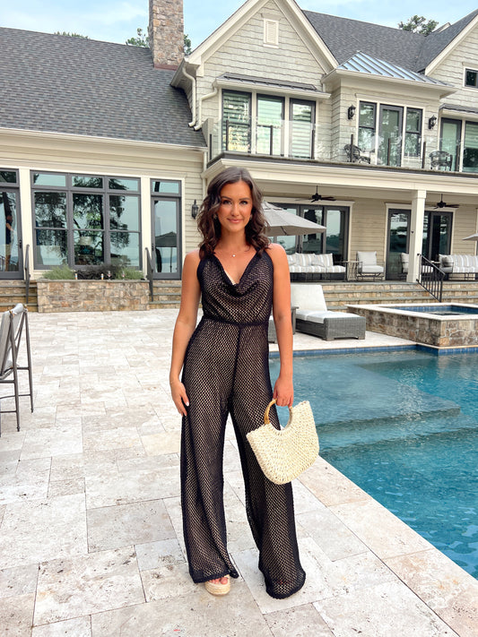 Guardala indossare la tuta