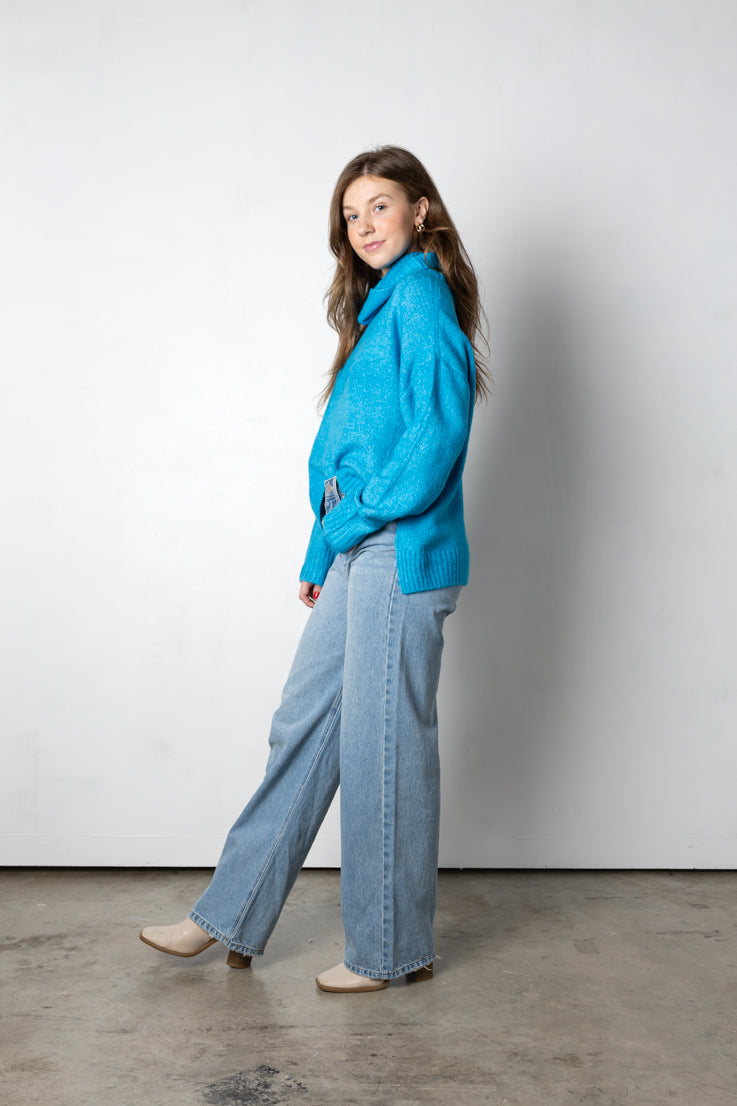 Continua a battere il dolcevita