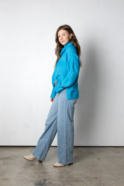 Continua a battere il dolcevita