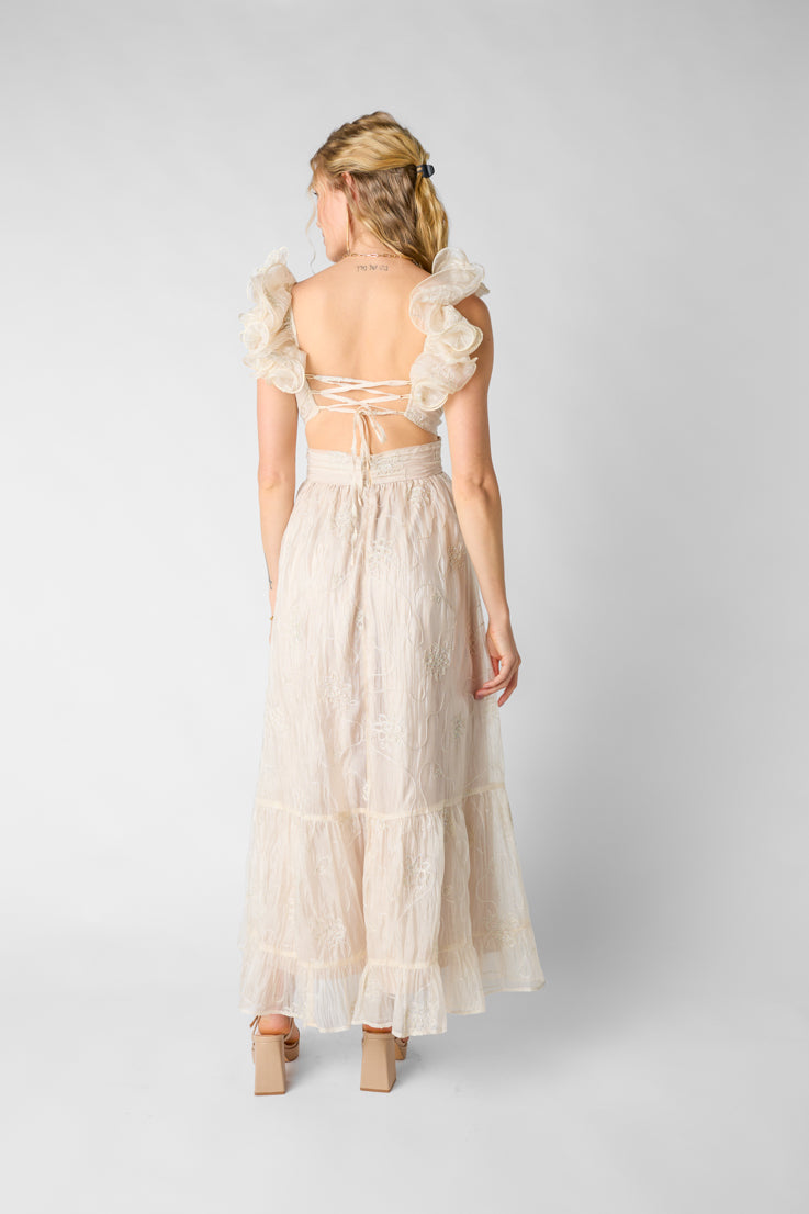 Abito lungo con champagne da sorseggiare