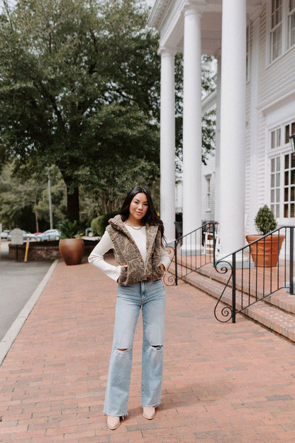 Gilet con foglie autunnali