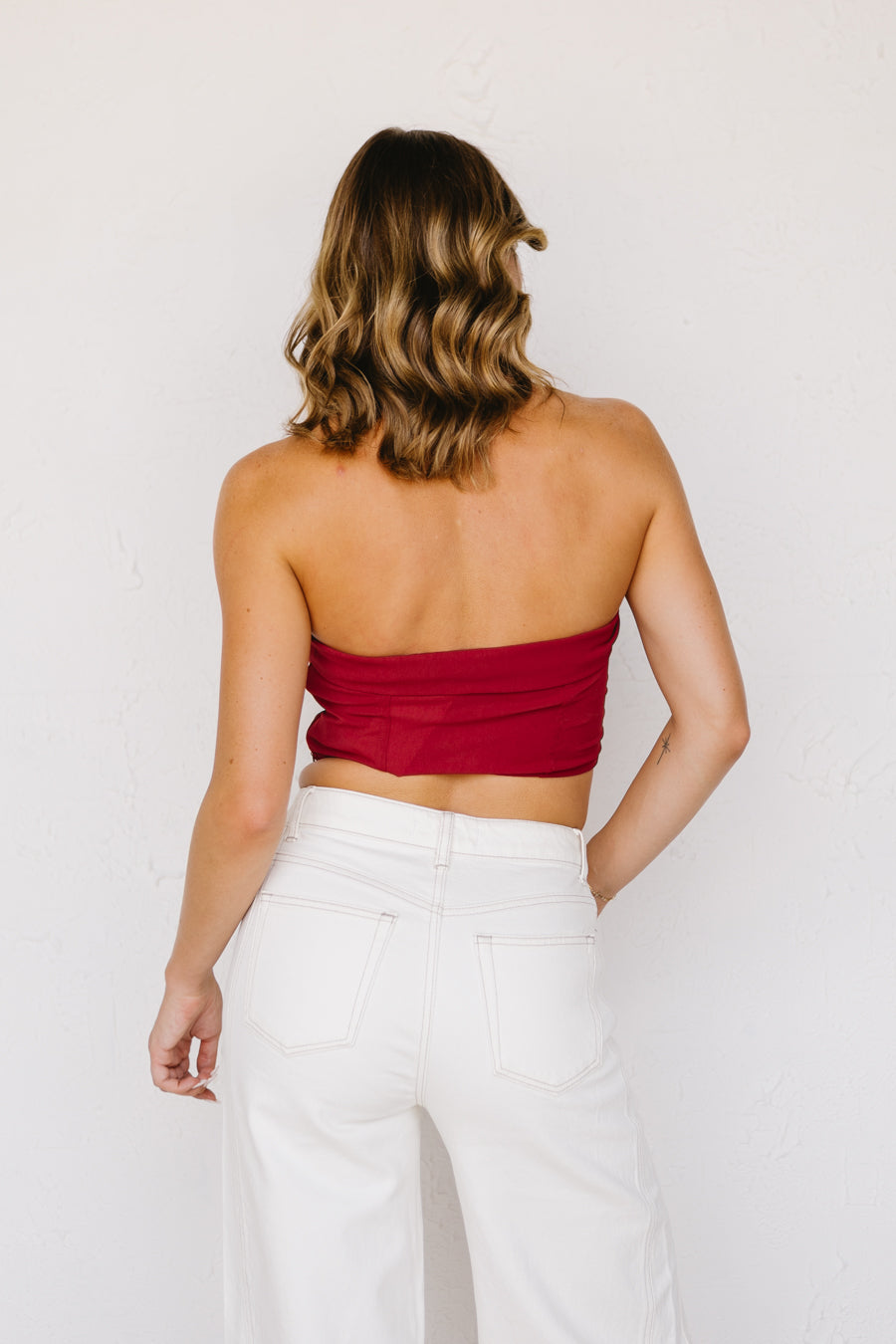 Top senza spalline arrogante