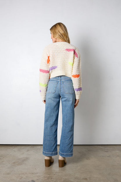 Cardigan con spruzzi arcobaleno