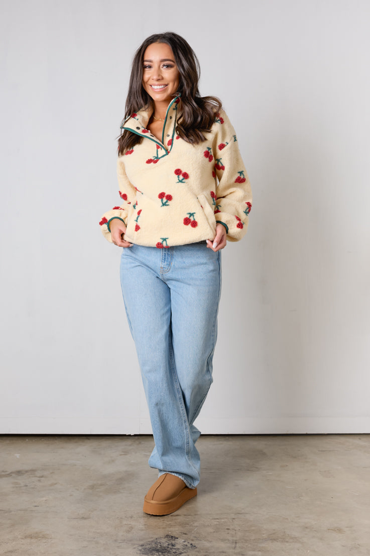 Maglione con ciliegie dolci