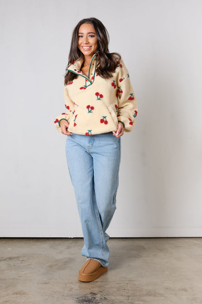 Maglione con ciliegie dolci