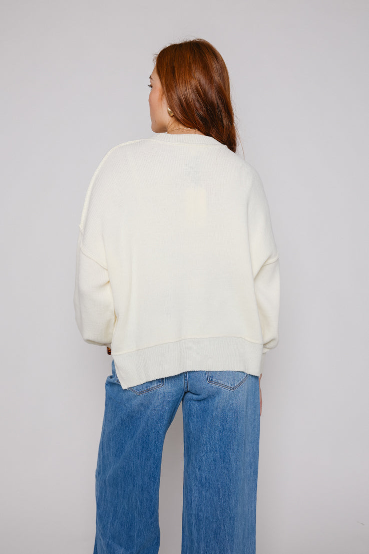 Maglione con cuori di caramella