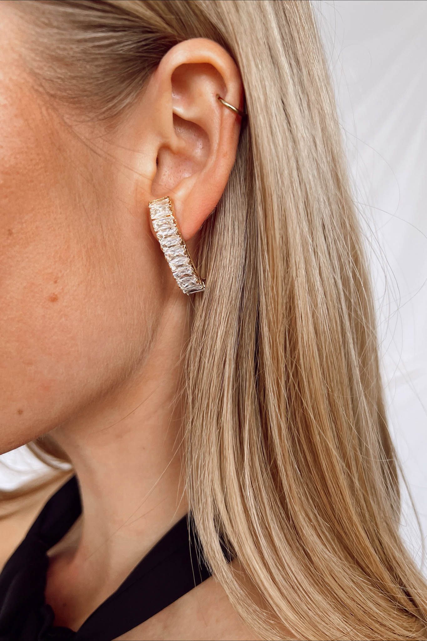 Orecchini a bottone a baguette