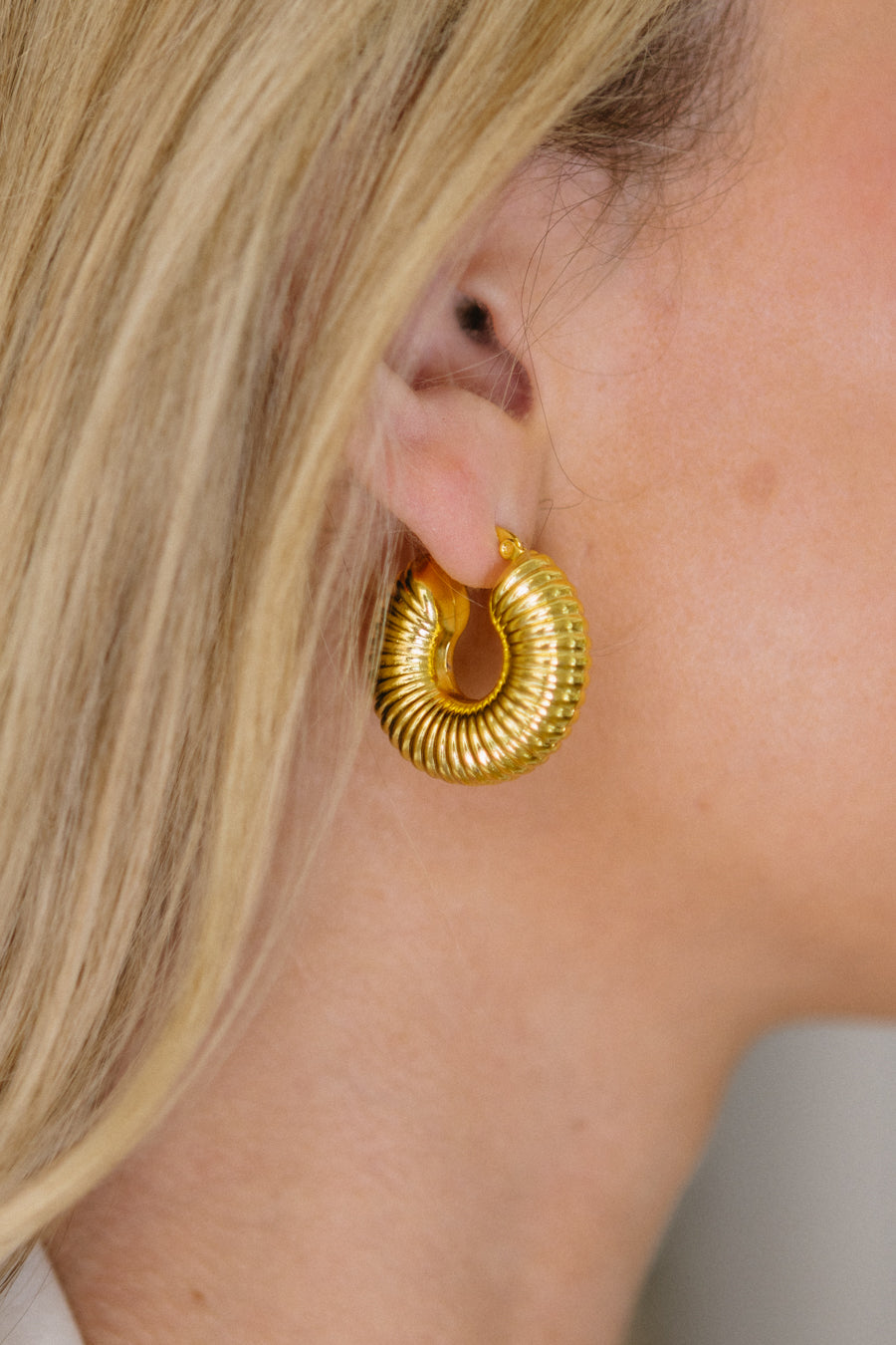Cerchi a spirale in oro