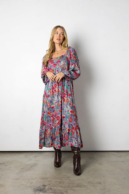 Abito lungo con fiori autunnali