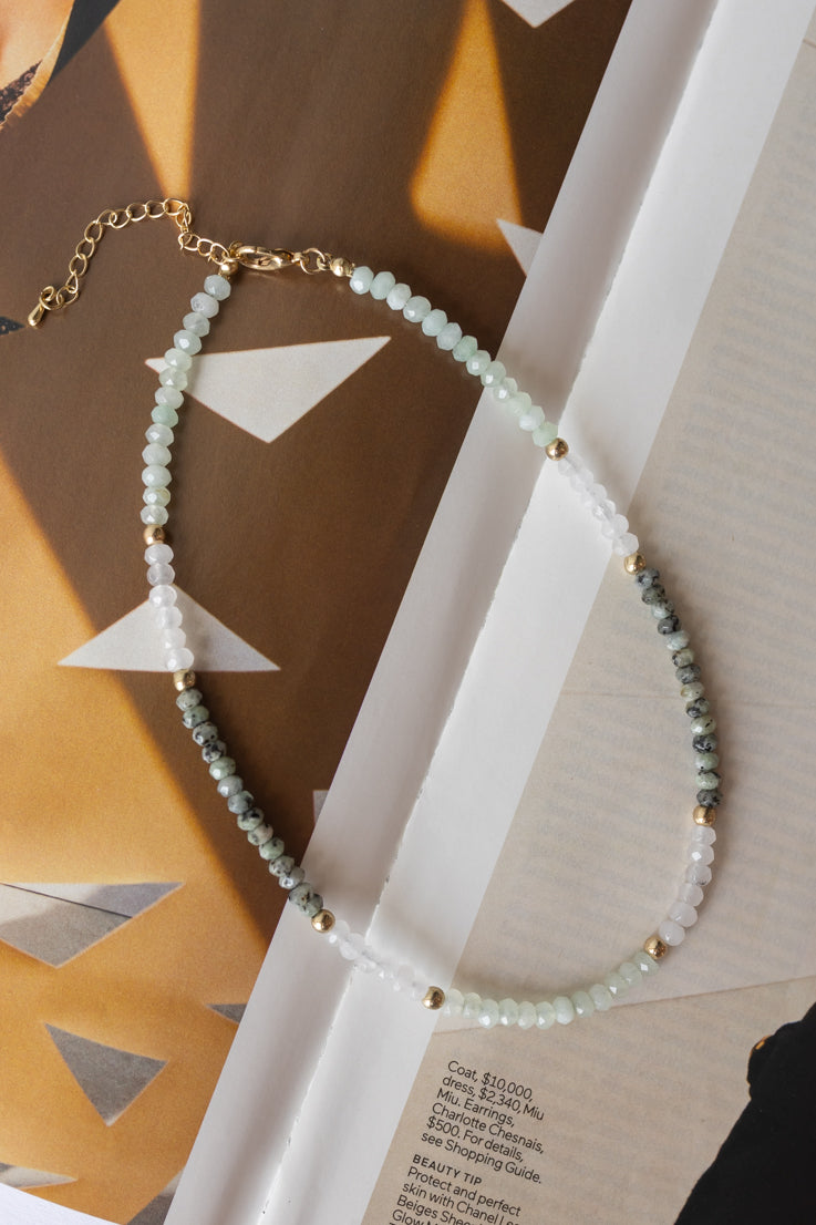 Collana con ciondolo a forma di pietre da lancio