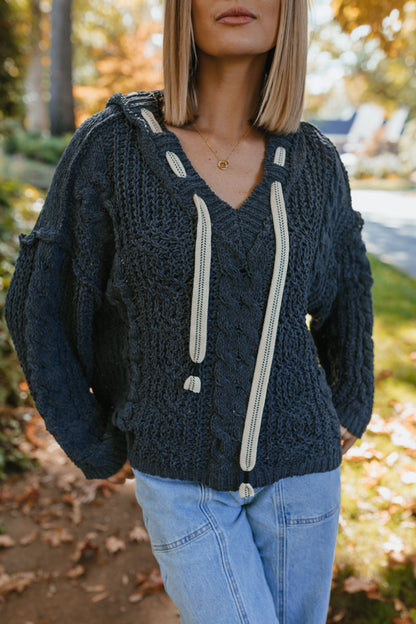 Maglione scuro e tempestoso