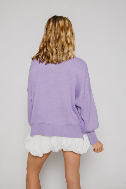 Maglione con cuori di caramella