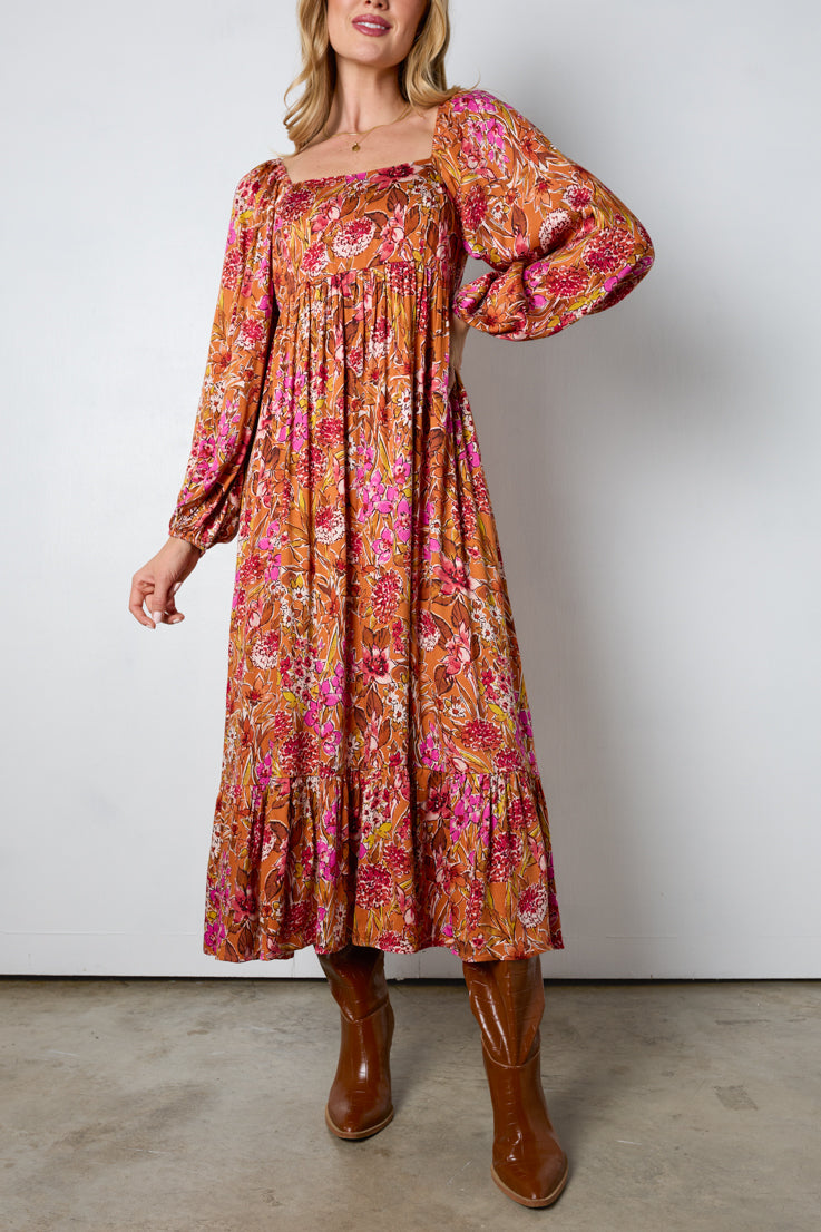 Abito lungo con fiori autunnali