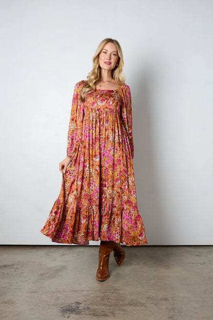 Abito lungo con fiori autunnali