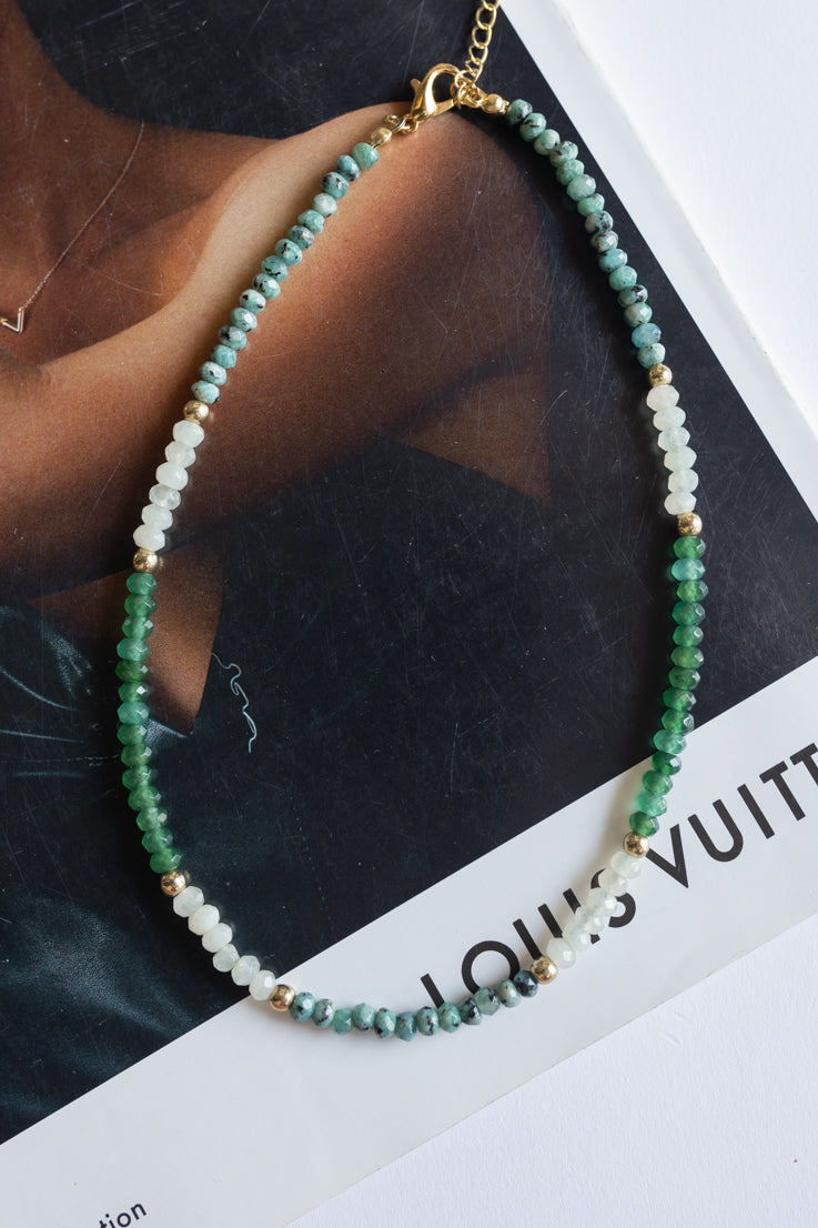 Collana con ciondolo a forma di pietre da lancio