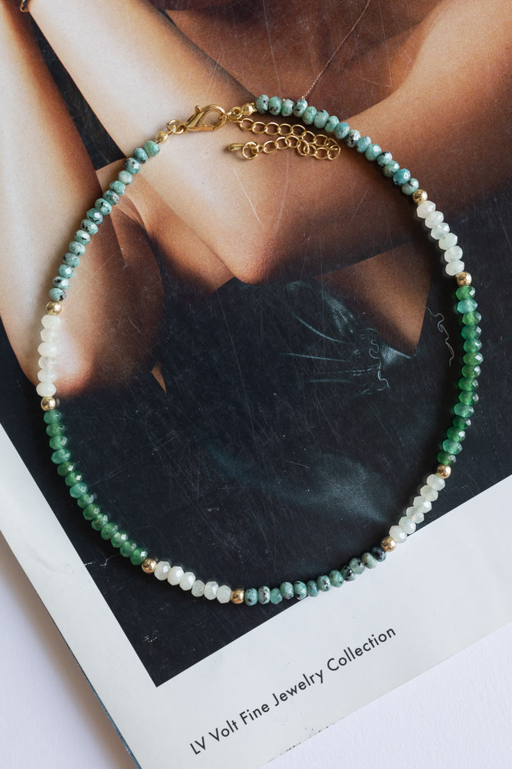 Collana con ciondolo a forma di pietre da lancio